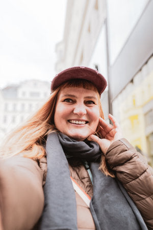 files/221566553-portrait-middle-aged-blonde-woman-in-selfie-style.jpg